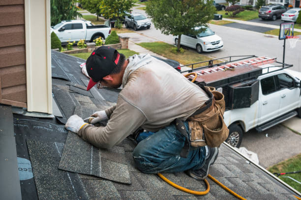 Professional Roofing technician working in Utica, PA